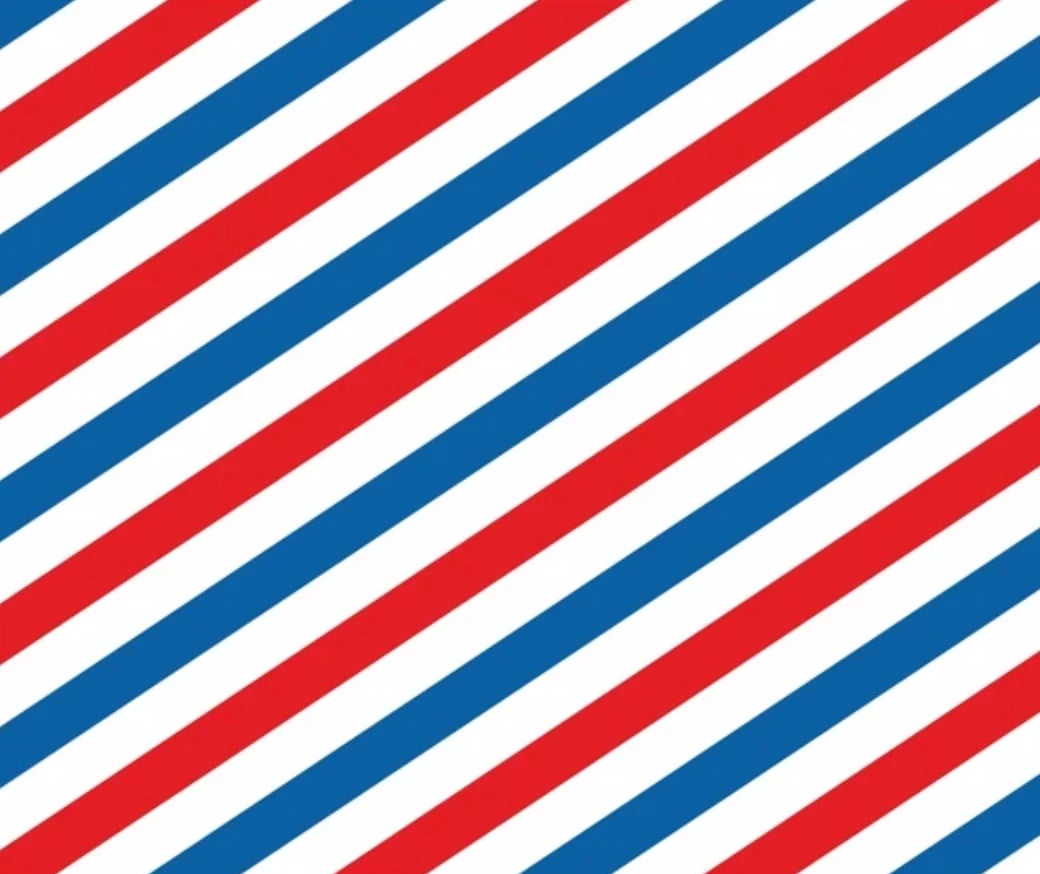 Diagonal striped pattern in red, white, and blue colors repeating across the image